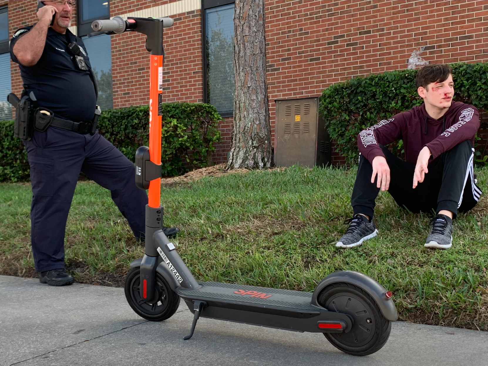 Man falls off scooter and gets injured